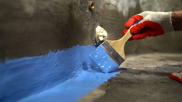 SJ Waterproofing Pros commercial waterproofing team near Lawrence, MI